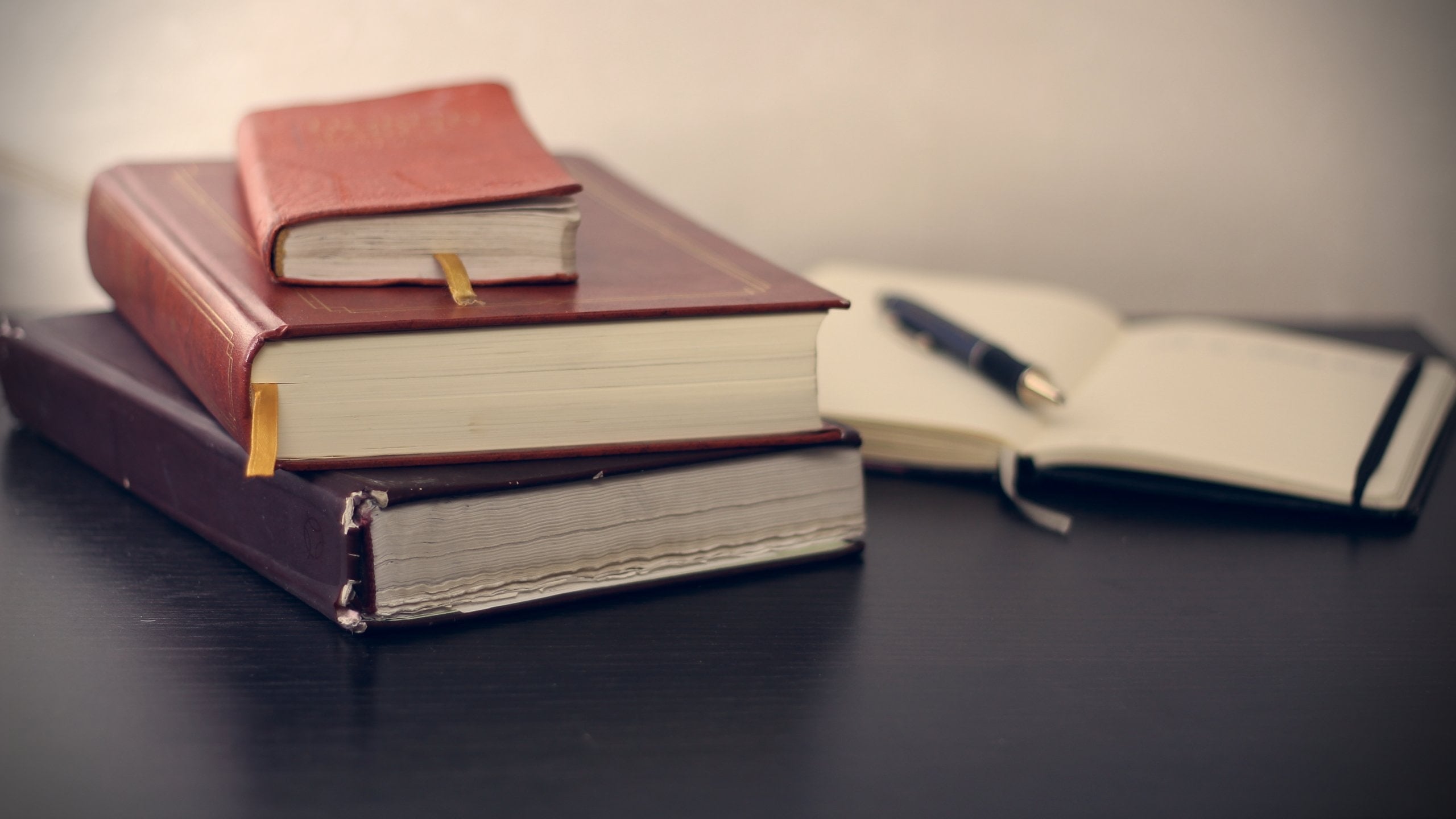 books stacked on desk